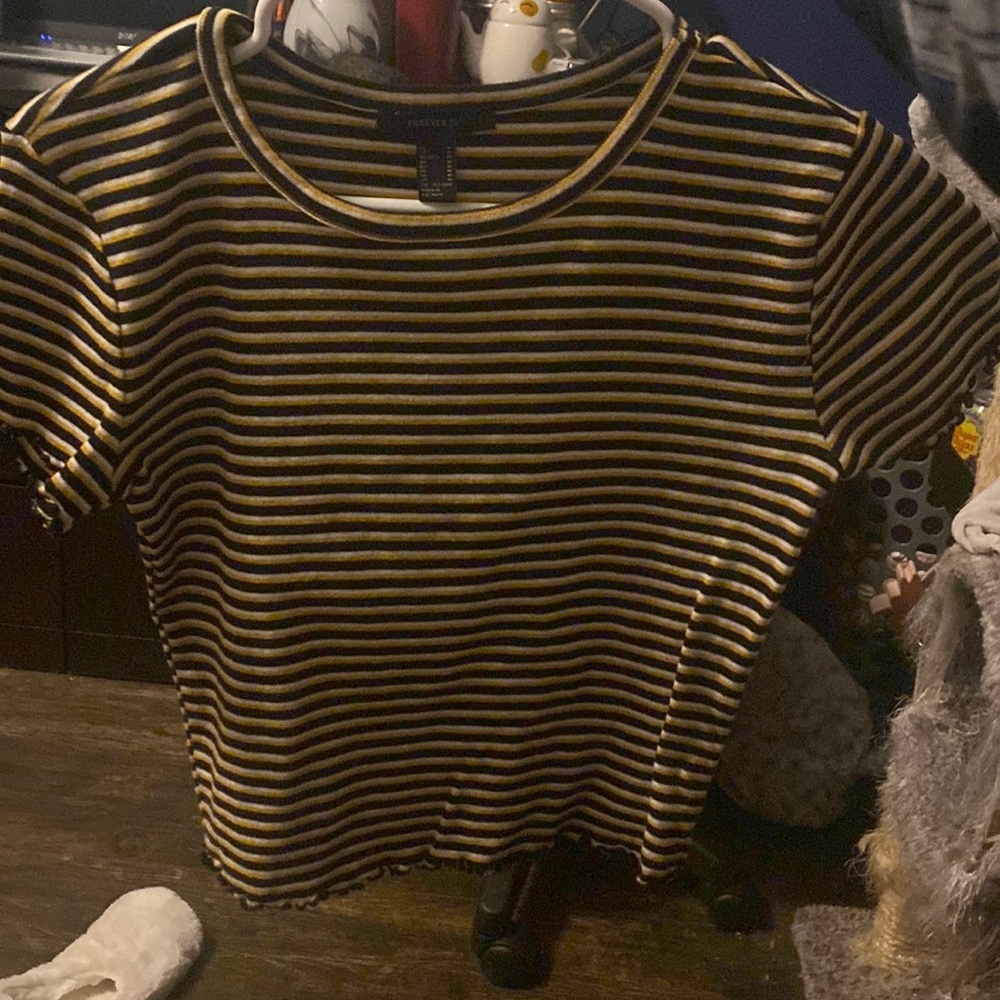 Shirt with ruffle ends